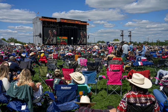 Attendees sit in camp chairs and watch Sierra Ferrell perform on the Big River stage at the Two Step Inn country music festival at San Gabriel Park on Sunday, April 21, 2024 in Georgetown, Texas.